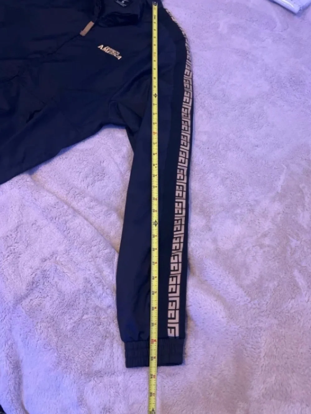 Nike Black Windbreaker Jacket with Gold Sleeve Tape